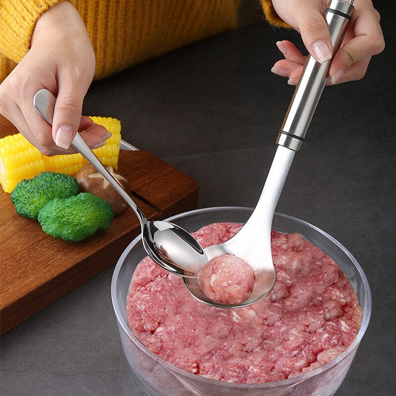 Lingura din inox cu gaura pentru chiftele, 24.5x6.5CM